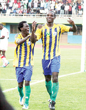 Salomon Nirisarike (R) celebrates with a team mate after scoring for the junior wasps against Nambia in the return of the first round qualifier in Kigali. The New Times/File.
