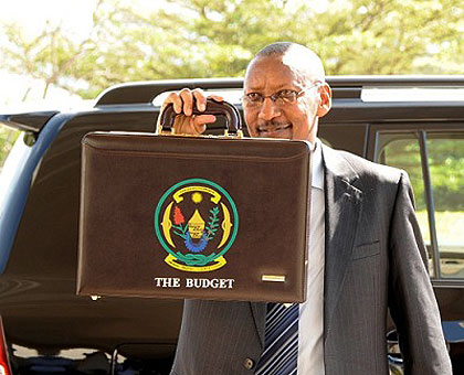 Finance Minister John Rwangombwa shortly before presenting the 2012/13 Budget to Parliament in June. The New Times/ File. 