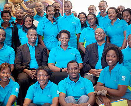 First Lady Jeannette Kagame (C) in a group photo with some of the youths who attended the Forum.  The New Times / Timothy Kisambira.
