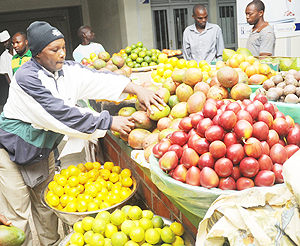 Fruit vendors in the Kigali City Market. Rwanda is one of the countries that have strong food balance sheet. The New Times / John Mbanda.