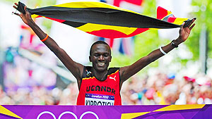 Ugandau2019s Stephen Kiprotich stunned a strong Kenyan team to win the menu2019s Olympic marathon on Sunday, handing his east African nation only their second ever gold medal. Net photo.