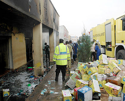 Fire fighters put out a fire on Matheus street in 2009. The New Times / File.