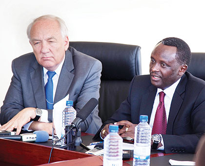 Ambassador Stephen Rapp, head of the US office of Global Criminal Justice, and Rwandau2019s Prosecutor General Martin Ngoga addressing journalists in Kigali yesterday. The New Times / Timothy Kisambira.