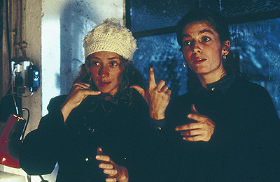 Lara (R) and Clarrise (L) doing the sign language.