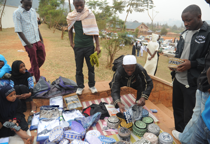 4.tA young man sells Islamic caps. The New Times / John Mbanda.