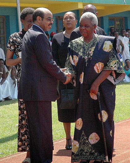 Meles Zenawi greets Mrs Maria Nyerere when they both attended Rwanda's 15the Liberation Day celebrations in Kigali. The New Times / File.