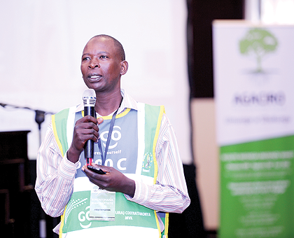 Jean Baptiste Bimenyimana, a motocyclist, speaking at the launch of the Agaciro Development Fund yesterday. The New Times/Courtesy.