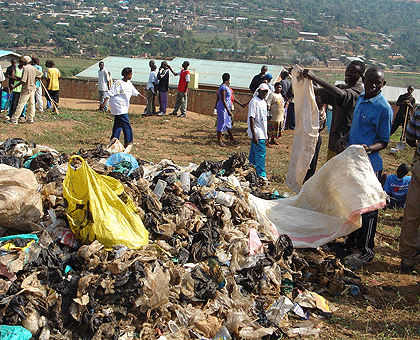 Plastic bags being destroyed. The materials were banned to protect the environment. The New Times / File.