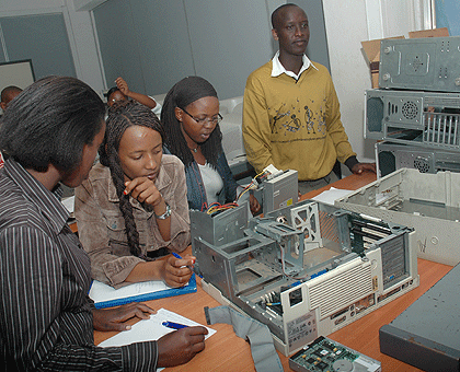 KIST students repair computers. Such skills have been introduced in secondary schools. The New Times / File.