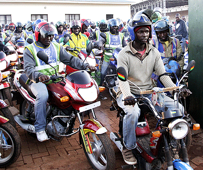 Members of motorcycle association, ASETAMORWA, duirng a past meeting; They are due to benefit from a morghage facility financed by FINA Bank. The New Times / File.