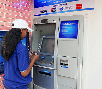 A client using ATM. The New Times / File.