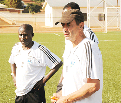 Junior wasps' assistant coach Aloys Kanamugire (L) and head coach Richard Tardy (R) oversee a past training seasion. The New Times / File.