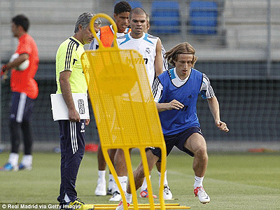 New boy Modric is put through his paces by Jose Mourinho. Net photo.