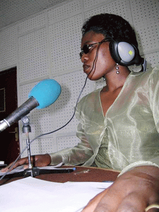 A Journalist at Radio Salus. The New Times/File.