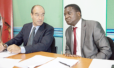 Jonathan Hal,  Managing Director for Bralirwa (L) and Willy Ngana, the Financial Director.  The New Times  / File