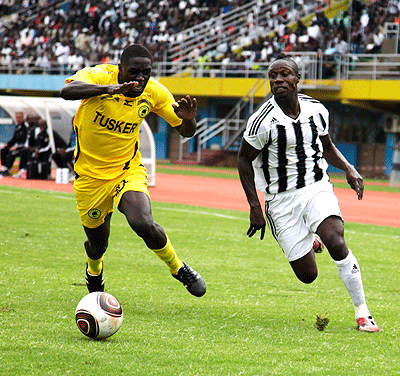 Kabange Twite, (R), who enjoyed five successfull seasons at APR is reported to have rejoined Lupopo in a short deal. The New Times / File.
