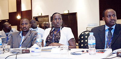 Participants following a presentation during the launch of Aid effectiveness in Rwanda. The New Times/Timothy Kisambira.