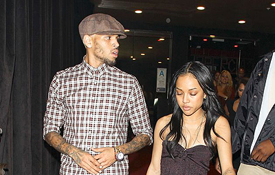 Brown and new girlfriend Tran. Net photo