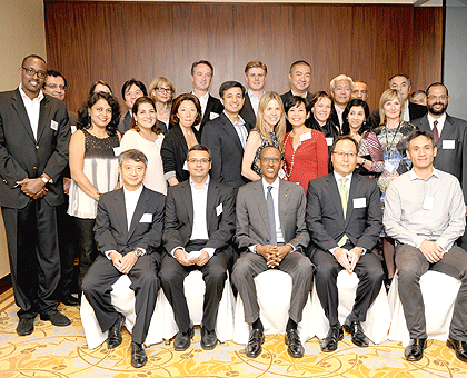 President Kagame (C) with members of the Hong Kong chapter of the Young Presidents Organisation yesterday. The New Times / Village Urugwiro.
