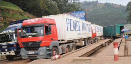 Transit trucks at Rusumo along the Rwandan-Tanzanian border. The New Times / File.