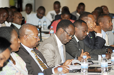 Governors and other local leaders at a recent meeting on performance contracts. The New Times File.