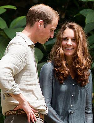 Britain's Prince William, left, and Kate, the Duchess of Cambridge speak to each other during their visit at the Borneo Rainforest Lodge in Danum Valley, some 70 kilometers (44 miles) west of Lahad Datu, on the island of Borneo Saturday. AP
