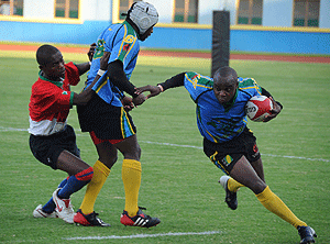 Vincent Kamali (R), seen here in action against Burundi in a past international match at Amhoro stadium.  The New Times / File.