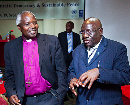 Archbishop Onesphore Rwaje (L) chats with MP Desire Nyandwi during the democracy platform yesterday. All top clerics attended. The New Times / T.Kisambira.Archbishop Onesphore Rwaje (L) chats with MP Desire Nyandwi during the democracy platform yesterday.