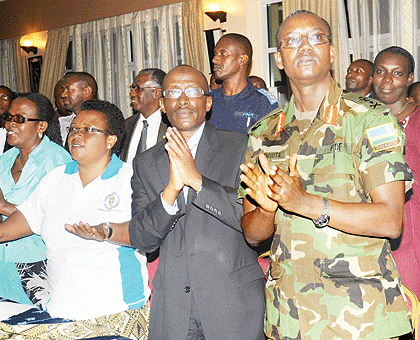 Officials join artists in singing at the closure of the Peace and Democracy week on Friday.  The Sunday Times / John Mbanda.