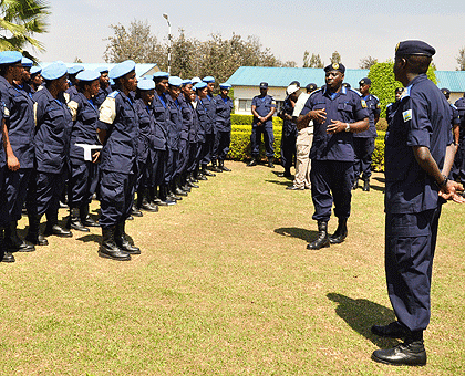 Inspector General of Police, Emmanuel Gasana welcoming back female police officers from a UN mission in Darfur at Police headquarters in Kacyiru yesterday. The Sunday Times/Courtesy.