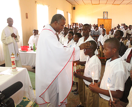 Mgr Alphonse Rutaganda, in charge of Catholic schools and education in Rwanda, presided over the confirmation during the event on Sunday. The New Times / JP Bucyensenge.