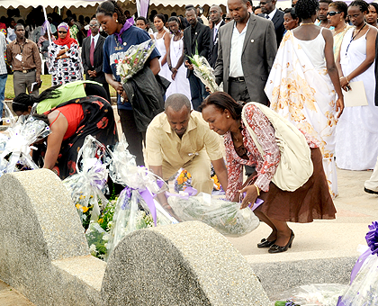 Some of the family members and officials lay wreaths on the graves of politicians killed during the 1994 Genocide, at their cemetery on Rebero Hill. The New Times / File.
