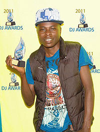 DJ Erycom and his 2011 award for East Africau2019s best DJ. Net photo.