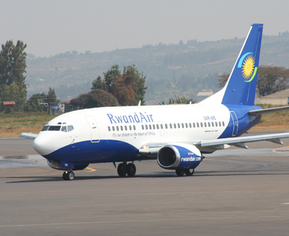 A Rwandair plane lands at Kigali International Airport. Harmonised airspace control will benefit stakeholders. The New Times / File.