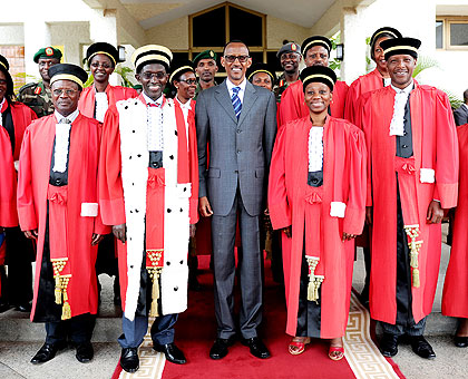 President Kagame poses with top Judiciary officials at the Parliamentary Buildings yesterday. The New Times / Village Urugwiro. 