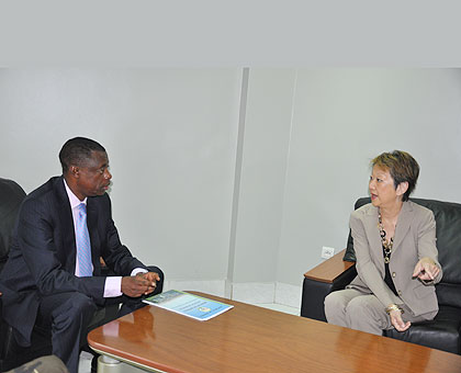 Minister James Kabarebe and UN's Judy Cheng-Hopkins during their meeting yesterday. The New Times Courtesy.