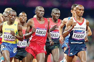 Robert Kajuga (left) competed in the Olympics Games. He finished 12th in the world half marathon yesterday in Bulgaria. Net photo.