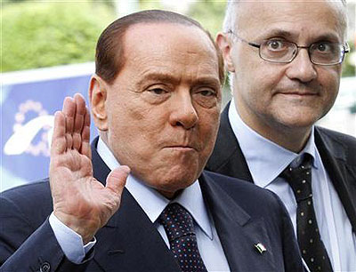 Italyu2019s former Prime Minister Silvio Berlusconi waves as he arrives for a meeting of the European Peoples Party (EPP). Net photo.