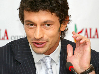 Kakha Kaladzeu2019s office is decorated with images of his football triumphs. Net photo.