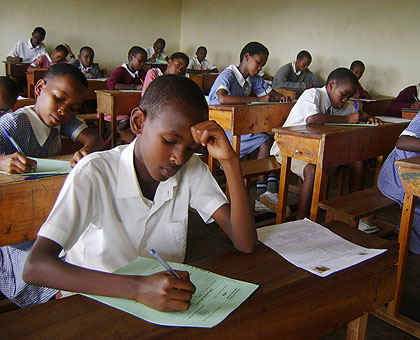 Primary school candidates sit their exams. The New Times / File.