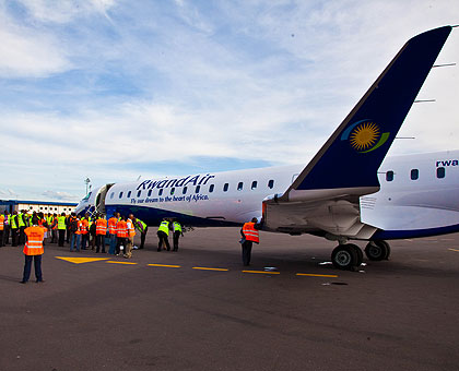 The newly acquired CRJ900 jet upon arrival at Kigali International Airport yetserday.  The New Times / Timothy Kisambira.