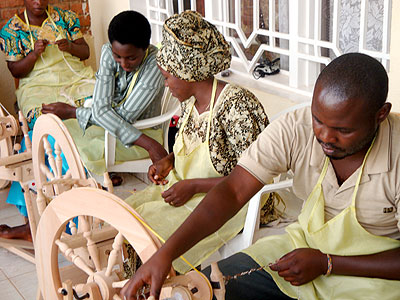 men at work making fibre threads from banana.