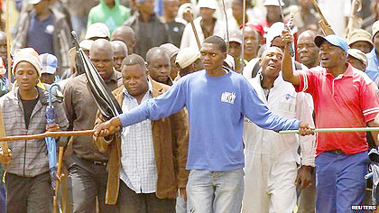 Angry workers march during the protest. Net photo