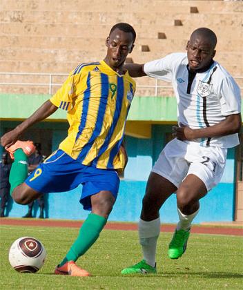 IN THE SPOTLIGHT: Thato Kebue (right) is one of the six Botswana players said to be over the age of 17.  The New Times / T. Kisambira.