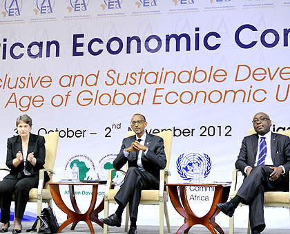President Kagame with Dr Donald Kaberuka, AfDB chief and UNDP Administrator, Helen Clark at the African Economic Conference in Kigali yesterday. The New Times / Village Urugwiro.