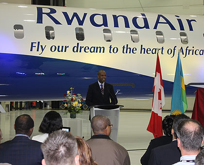 Rwandair's CEO, John Mirenge, addresses guests at handover ceremony of the first CRJ900 held at Bombardieru2019s Mirabel, Quu00e9bec facility, last month. The New Times / File.
