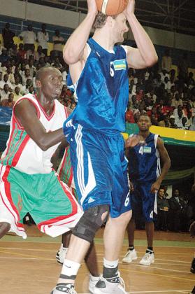 Thompson, seen here in action against Burundi during the 2009 Zone V championships held in Kigali, says is opposed to the idea of using many 'foreigners'. The New Times/File.
