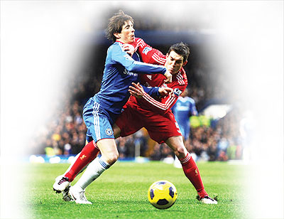 Fernando Torres of Chelsea is challenged by Daniel Agger of Liverpool last season. The two sides meet on Sunday at Stanford Bridge. Net photo.