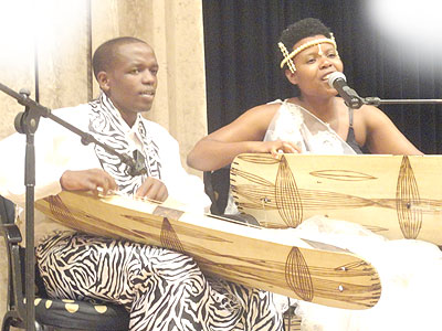 Sophie Nzayisenga, Inanga teacher performs with one of her students.