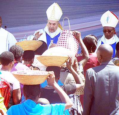 Pilgrims giving  their offerings at Kibeho. The New Times/File.